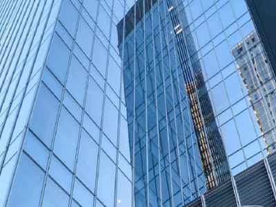 Ultra low radiation coated glass building